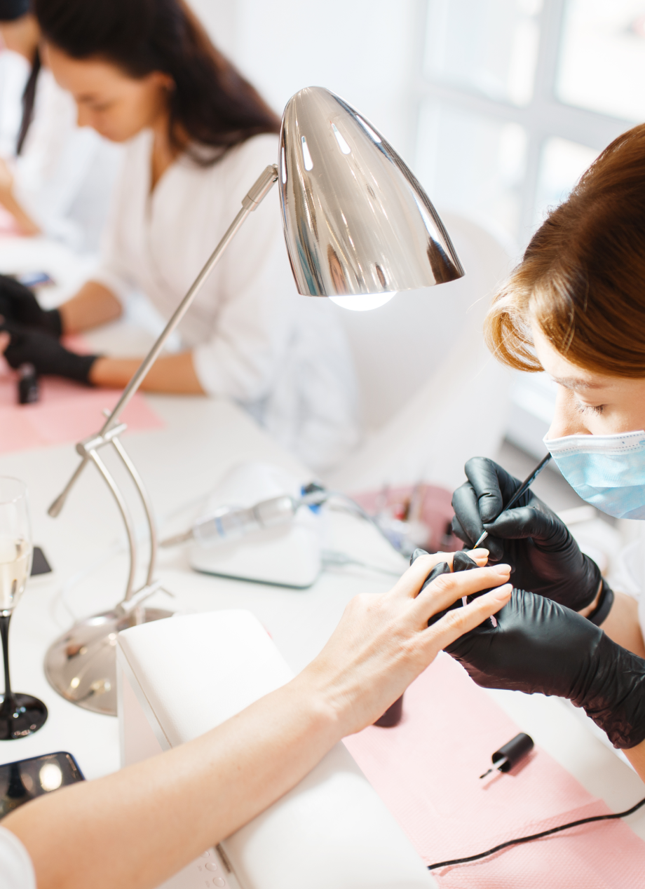 Nail technician giving a professional manicure